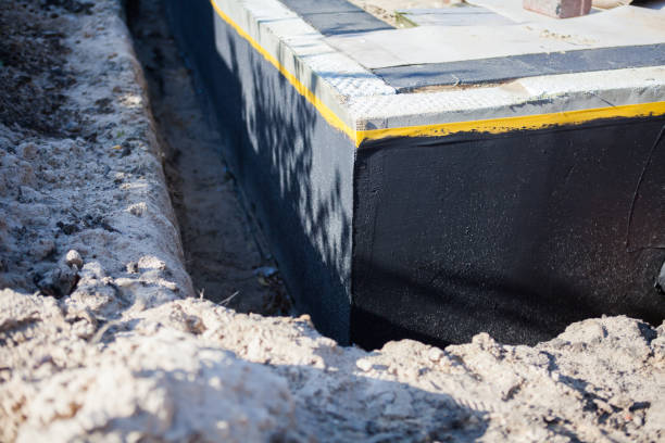 Professional Interior Drainage System technician working in Austell, GA